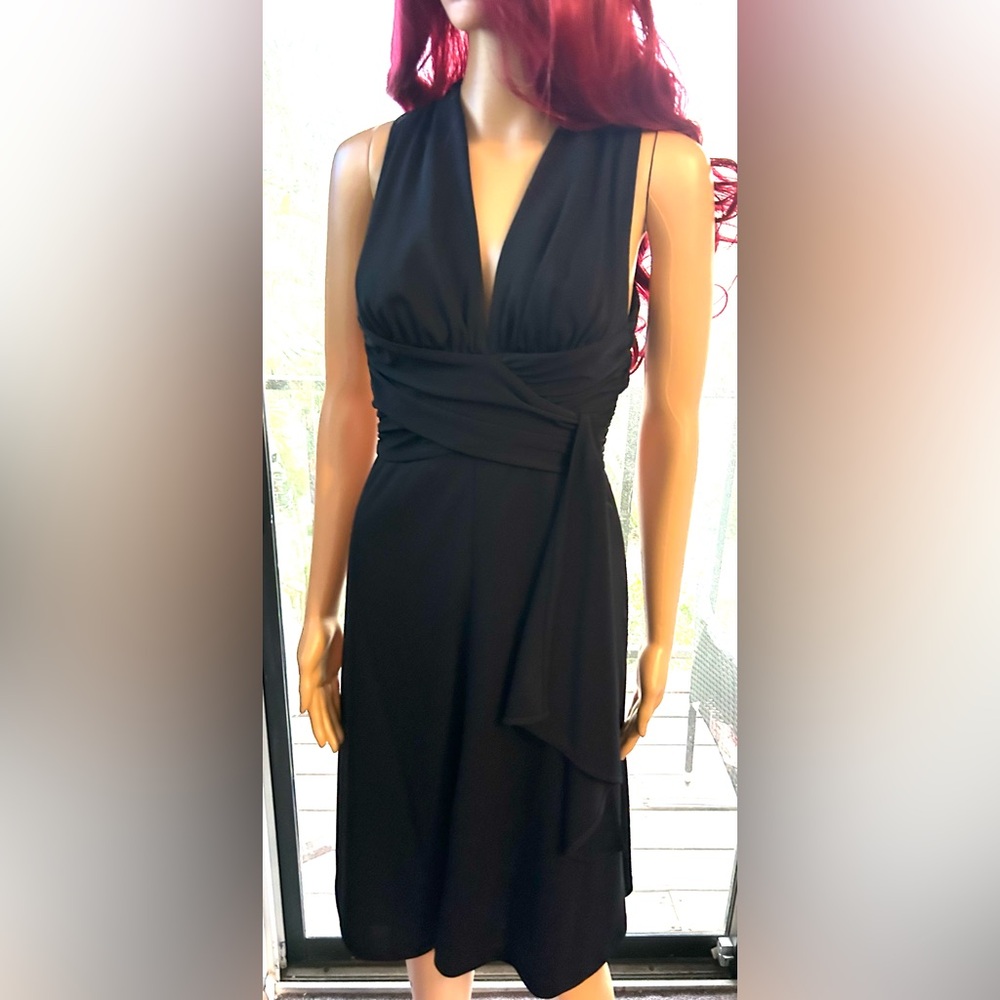 White House Black Market flattering, black dress. Built in bra. Sz. 8
